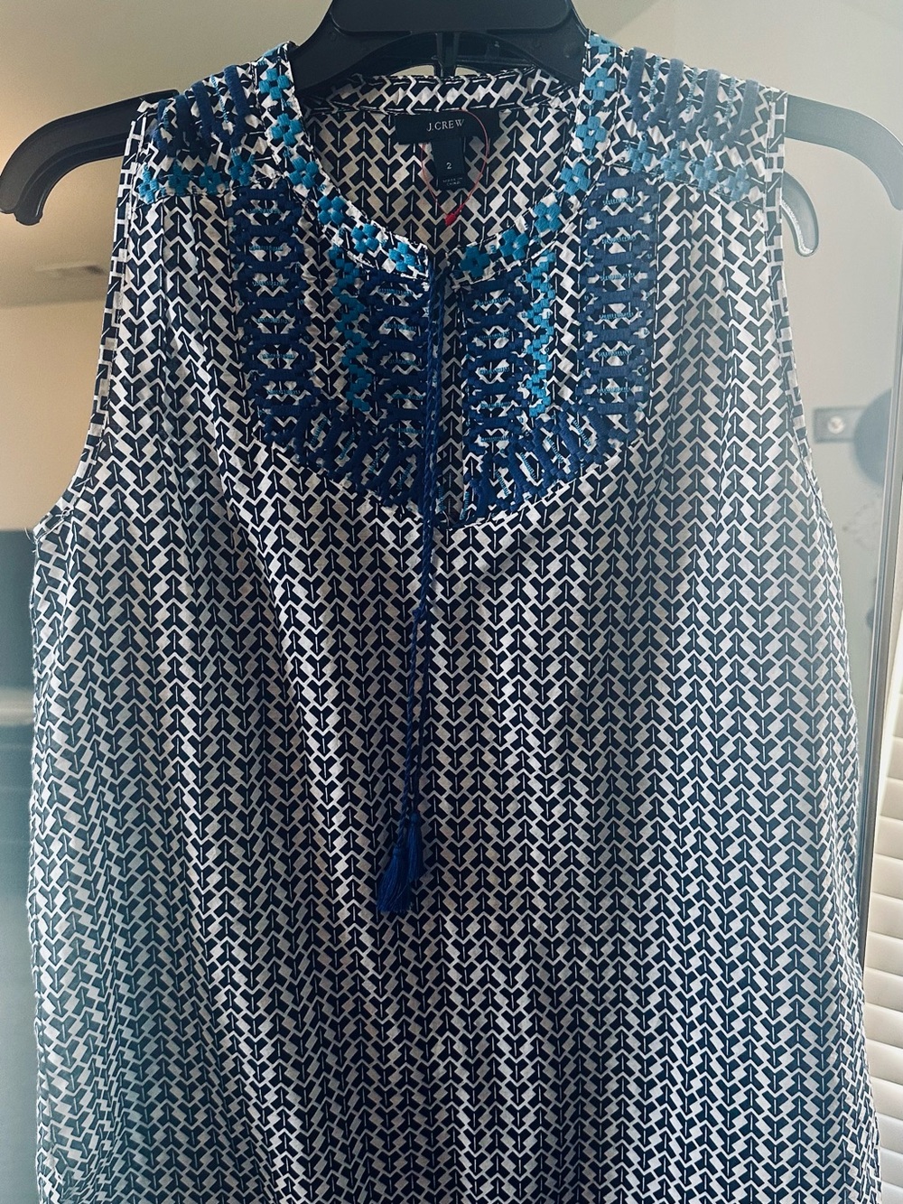 J. Crew black and White Sleeveless top w/Blue Embroidered and tassels like new